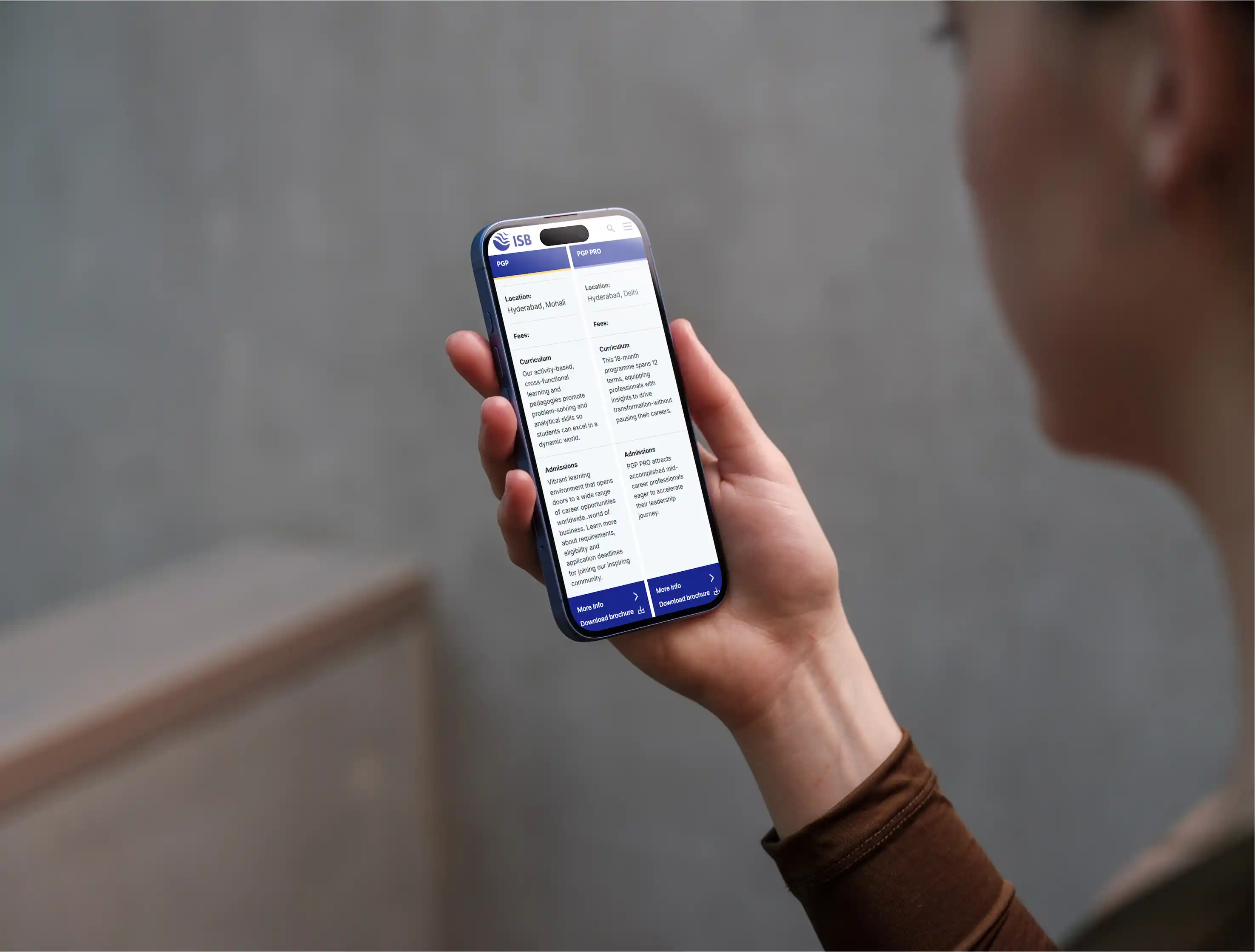 Man holding iPhone showing ISB mobile experience